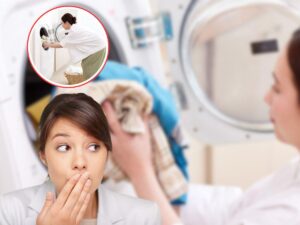 donna con mani in asciugatrice, un'altra sorpresa e un'altra con asciugamani in mano